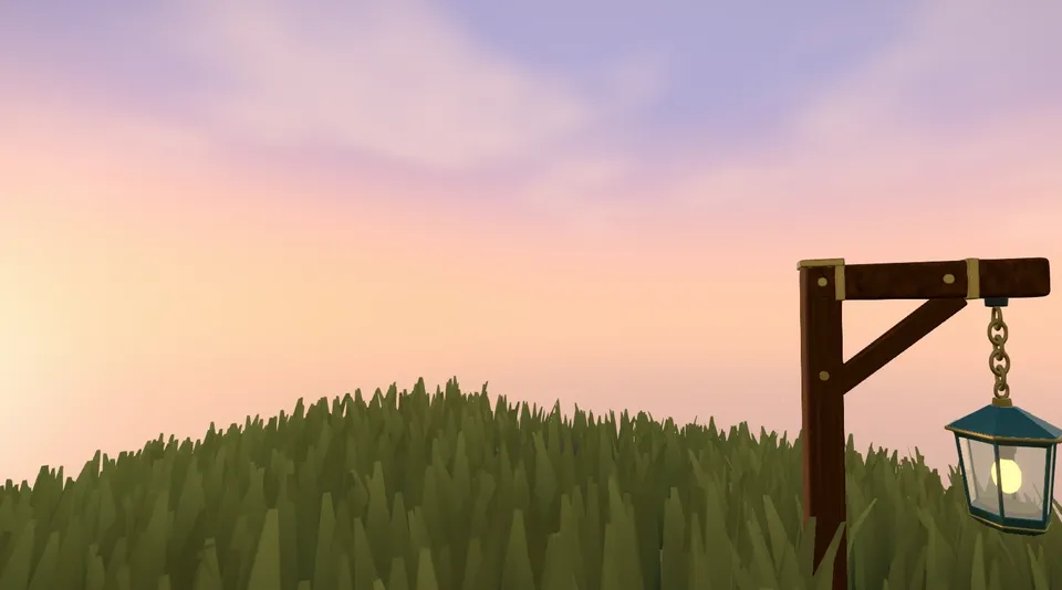 A grassy hill at sunset beside a hanging lantern