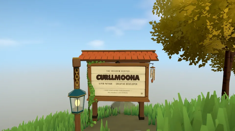 The Curllmooha sign on a hill, with a lantern and a golden tree