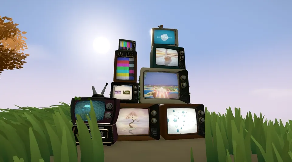 A stack of old televisions in the grass, each showing a project